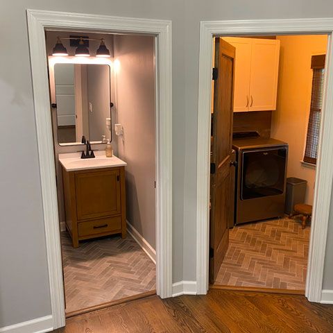 renovated space laundry bathroom