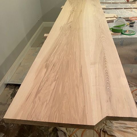 Cabinet top made of 3 hickory board planks, pre-stain.